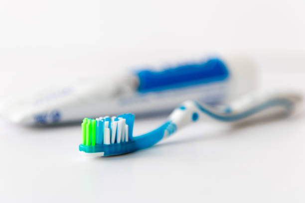 Tooth brush and paste isolated in white. Dental care.