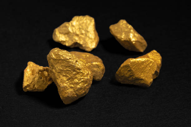 istock The pure gold ore found in the mine on black background 1477449787