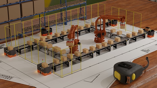 Engineer lay conveyor model on layout blueprint for design production line