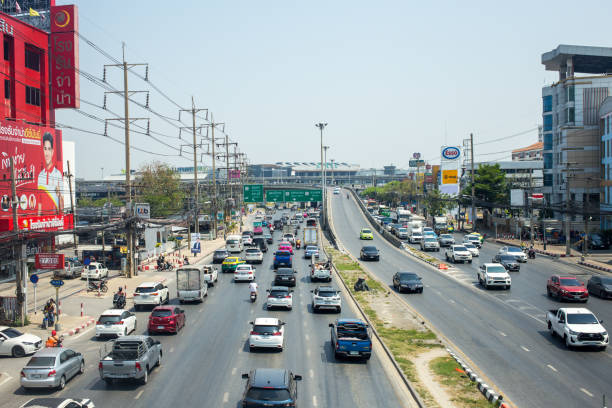Bangkok, Thailand - February 25 2023: Traffic on Rangsit-Pathum Thani road in Pathum Thani.