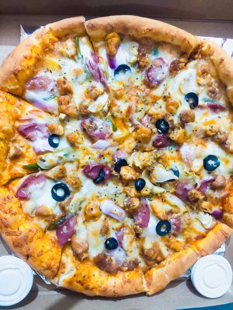 istock who doesn't like to have a pizza with some extra cheese? 1477463524