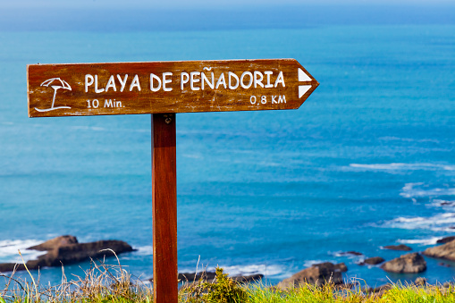 Vidio headland landscape, cliff , seascape in Asturias, northern Spain coastline .  Beach hiking pole.