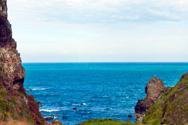 Vidio headland area seascape, cliff and horizon in Cudillero, Asturias, northern Spain coastline .