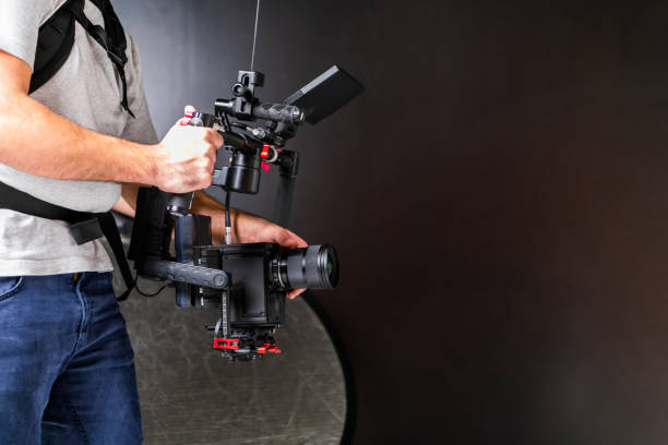 istock The cameraman in the studio using a professional camera with a stabilizer 1477469427