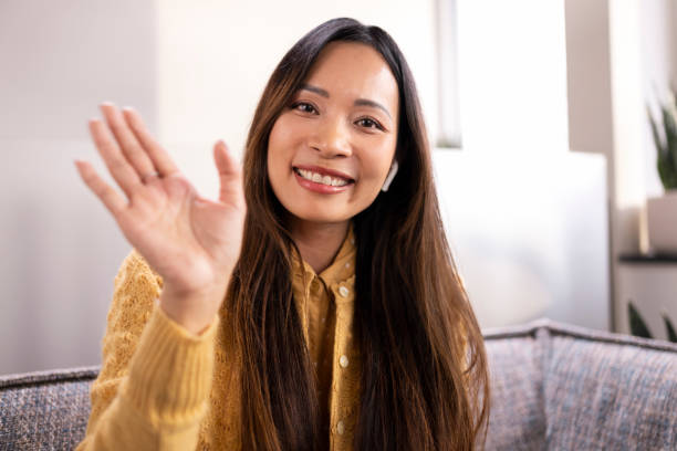 istock Business woman waving hand 1477470620