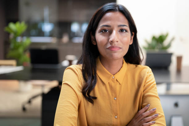 istock Woman sitting in office 1477470658