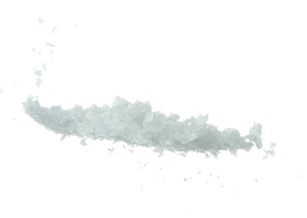 istock Salt rock flower fly explosion, white Salt rock flower explode abstract cloud fly. Big size ground salt splash in air, food object element design. White background isolated high speed freeze motion 1477471591