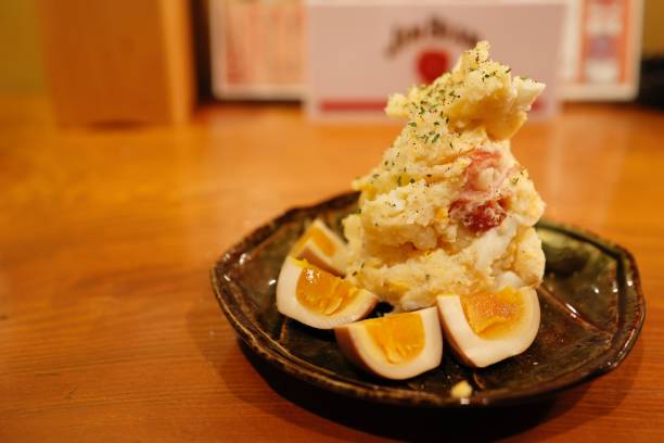 Potato salad served at a Japanese izakaya. stock photo