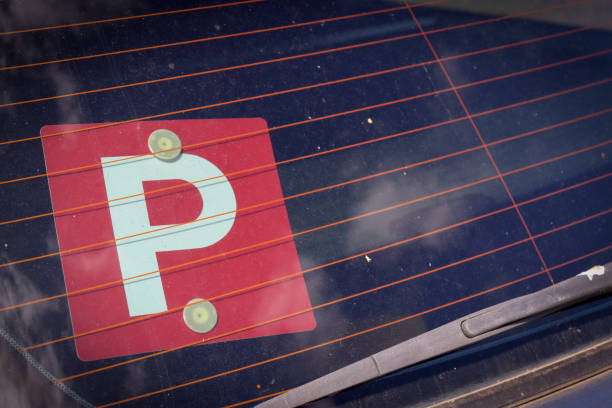 istock red P Plate on rear window of car 1477474796
