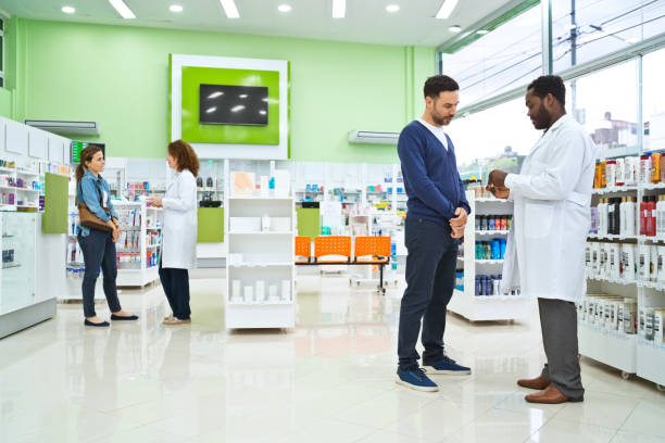 Customers and pharmacists in pharmacy