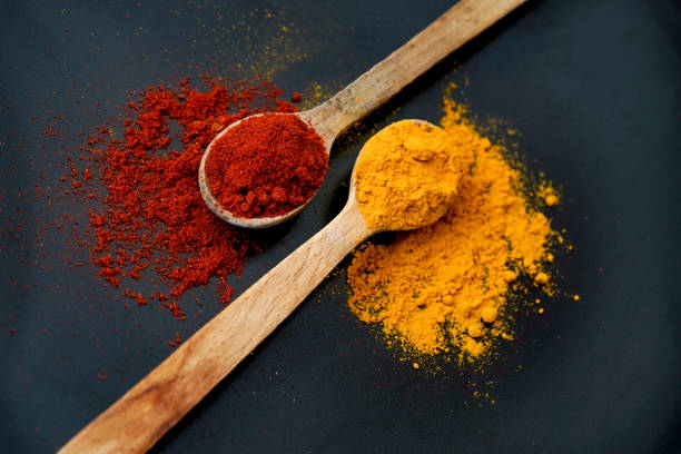 istock two wood spoons with smoked paprika and curcuma 1477479952