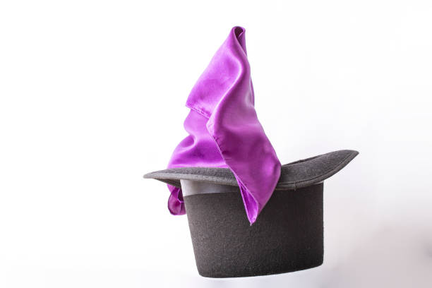 Silky fabric coming out of a tall hat, levitating on white background