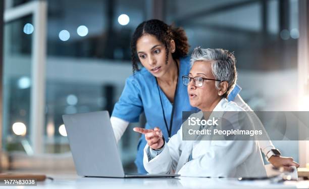 Doctors Nurse Or Laptop In Night Healthcare Planning Research Or Surgery Teamwork In Wellness Hospital Talking Thinking Or Medical Women On Technology For Collaboration Help Or Life Insurance App Stock Photo - Download Image Now