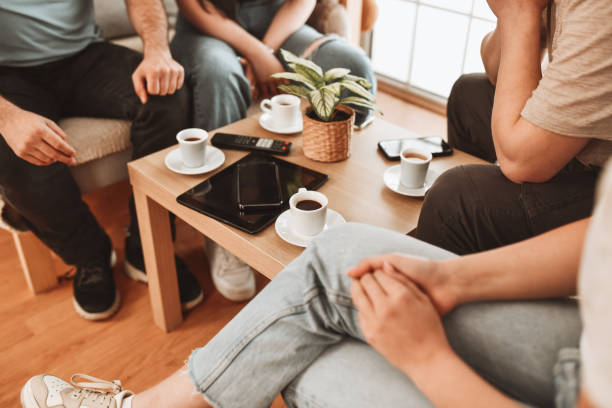 istock Fun Times For Couples Enjoying Coffee time At Home And Using Modern Technological Devices 1477487363