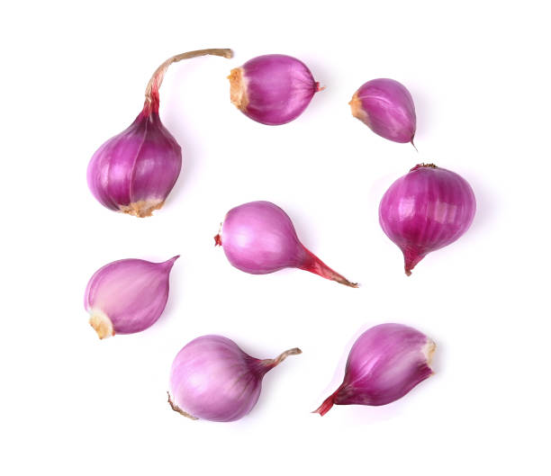 istock Unwrap purple onion isolated on a white background 1477488642