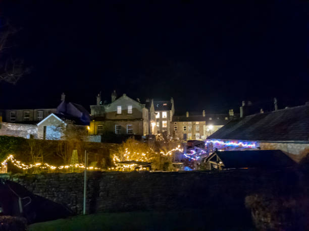 istock Christmas lights on a buildings in Alston 1477490097