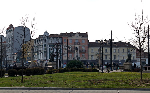 Sofia, Bulgaria -  January 14, 2023: Panoramic view of Lion`s Bridge over Vladaya river from 1889 with lion sculptures, ancient buildings, intersection and traffic lights, Sofia, Bulgaria. Visit in place.