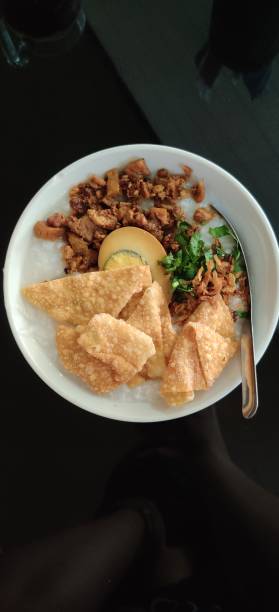 istock Chicken Porridge with brown egg 1477494270