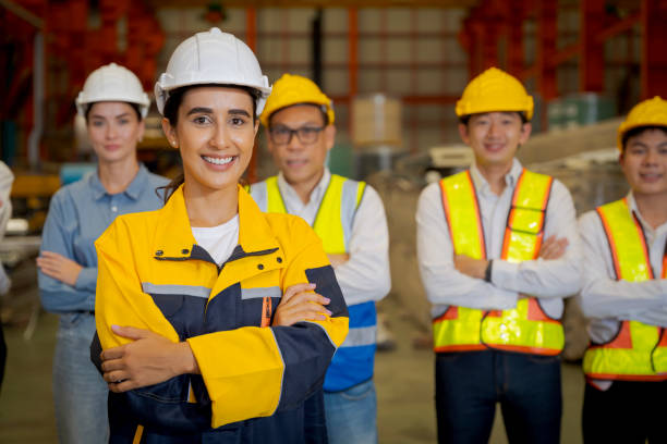 istock Group new generation of engineers in a metal sheet factory.  Studying work methods from supervisors or colleagues and studying by yourself  be taught professionally 1477501230