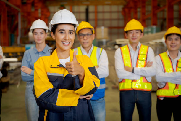 istock Group new generation of engineers in a metal sheet factory.  Studying work methods from supervisors or colleagues and studying by yourself  be taught professionally 1477501356