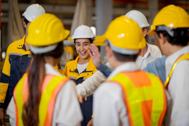 istock Group new generation of engineers in a metal sheet factory.  Studying work methods from supervisors or colleagues and studying by yourself  be taught professionally 1477501534
