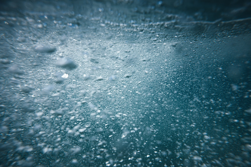 Underwater splash with bubbles.