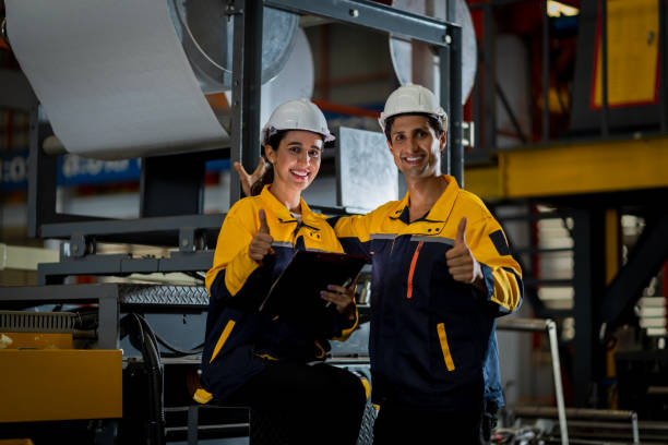 istock A new generation of engineers in a metal sheet factory.  Studying work methods from supervisors or colleagues and studying by yourself  be taught professionally 1477505017