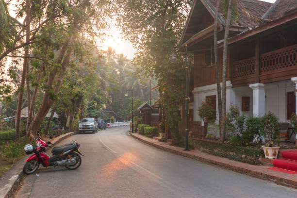 Street in old town Luang Prabang in Laos at sunset stock photo
