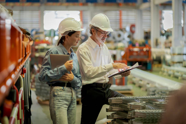 istock A new generation of engineers in a metal sheet factory.  Studying work methods from supervisors or colleagues and studying by yourself  be taught professionally 1477510396