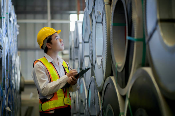 istock A new generation of engineers in a metal sheet factory.  Studying work methods from supervisors or colleagues and studying by yourself  be taught professionally 1477510786