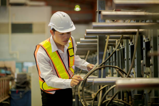 istock A new generation of engineers in a metal sheet factory.  Studying work methods from supervisors or colleagues and studying by yourself  be taught professionally 1477511689