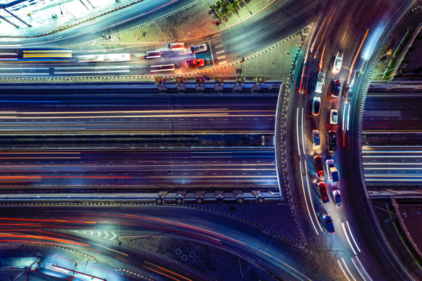 istock Expressway top view, Road traffic an important infrastructure, Drone aerial view fly in circle, traffic transportation, Public transport or commuter city life concept of economic and energ, transport. 1477514323