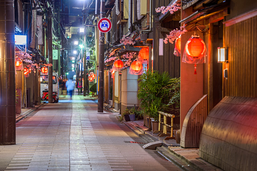 Kyoto, Japan street scene at night.