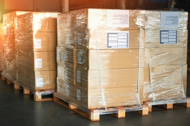 istock Package Boxes Wrapped Plastic on Pallets in Storage Warehouse. Storehouse Distribution Storage. Supply Chain. Shipping Cargo Supplies Warehouse Logistics. 1477518393