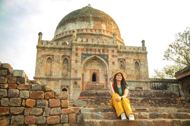 istock Woman admiring view at historic site 1477520393