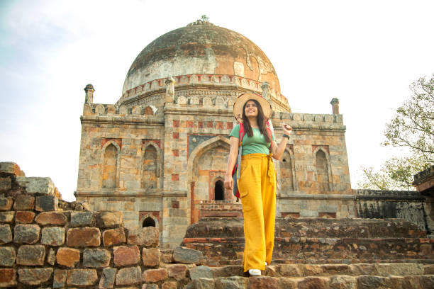 istock Woman admiring view at historic site 1477520437