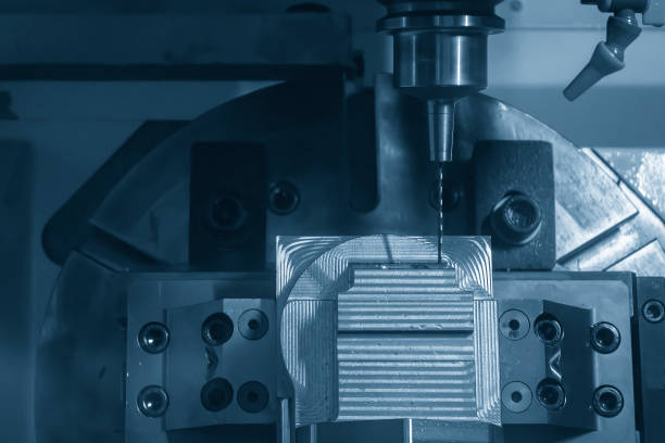 istock The hi-technology injection mold part manufacturing process by 5-axis machining center. 1477521744