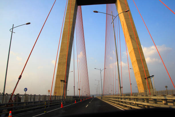 istock Suramadu bridge, a sturdy building construction with a barrier-free asphalt road 1477522401