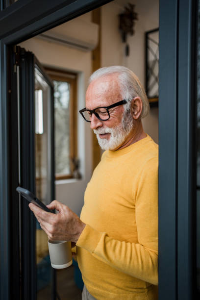 istock A gray-haired elderly man enjoys his morning coffee on the terrace 1477523670