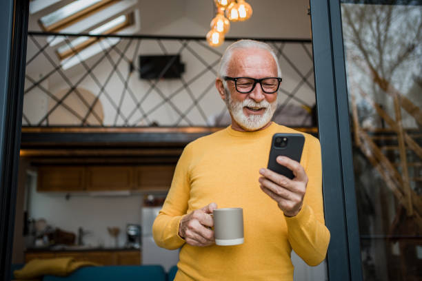 istock A gray-haired elderly man enjoys his morning coffee on the terrace 1477523986