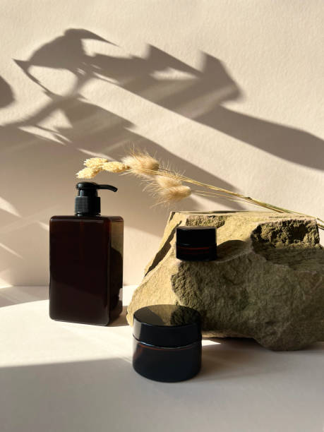istock Composition from the natural materials and different cosmetic bottles near it.Copy space for text or design.Can be used as advertising banner.Pastel colors. 1477524773