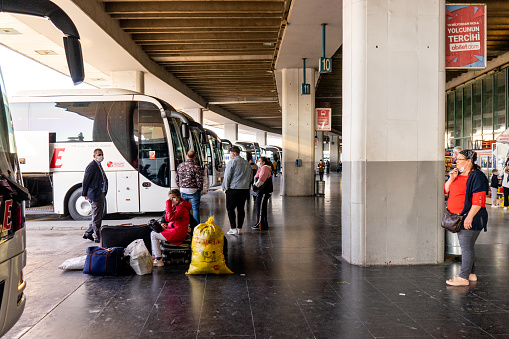 04/26/2021, İzmir/Turkey.
Buses and people waiting for buses at the izmir intercity bus terminal.