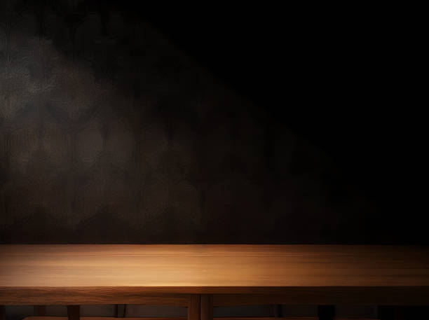 istock Wooden table with dark blurred background. 1477525611