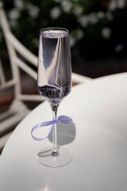 istock A glass of fresh cocktail with lavender on a white table 1477525671