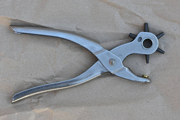 frontview of one office hole puncher isolated on a white background