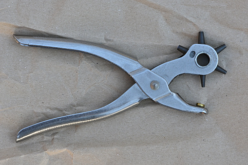 A pair of pliers on white background