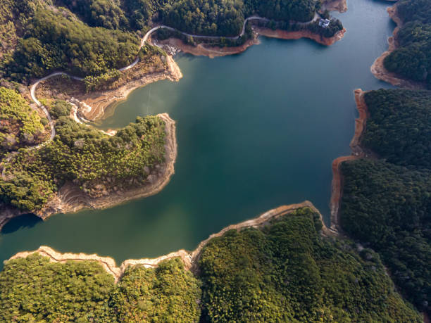 istock A lake surrounded by mountains and forests 1477526799