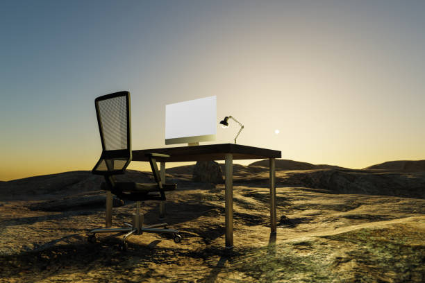 istock lonely pc workplace in large desert environment; remote work and digital nomad and climate crisis concept; 3D illustration 1477527766