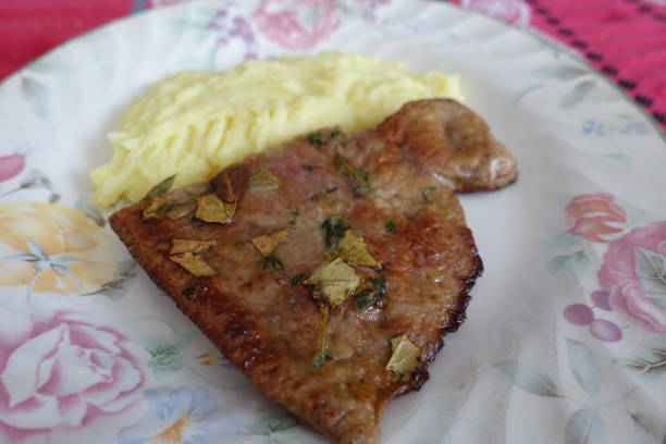 istock Veal liver fried with herbs served with mashed potatoes 1477533585