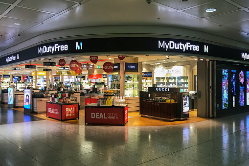 Duty-free store is a retail store located in Munich airports, that offers tax and duty-free goods to international travelers who are leaving or entering the country and typically include products such as alcohol, tobacco, perfume, cosmetics, electronics, and luxury items such as jewelry and watches.